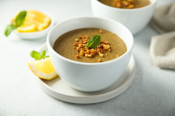 Traditional homemade lentil soup with lemon