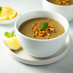 Traditional homemade lentil soup with lemon