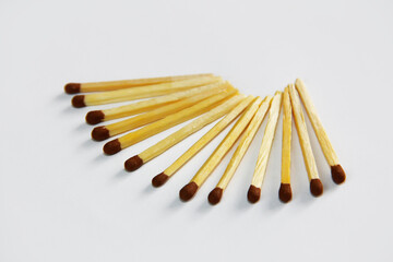 yellow wooden matches to light a fire