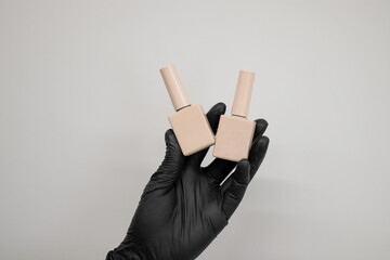 Mock up gel polish in hand. Powder gel polish for logo 