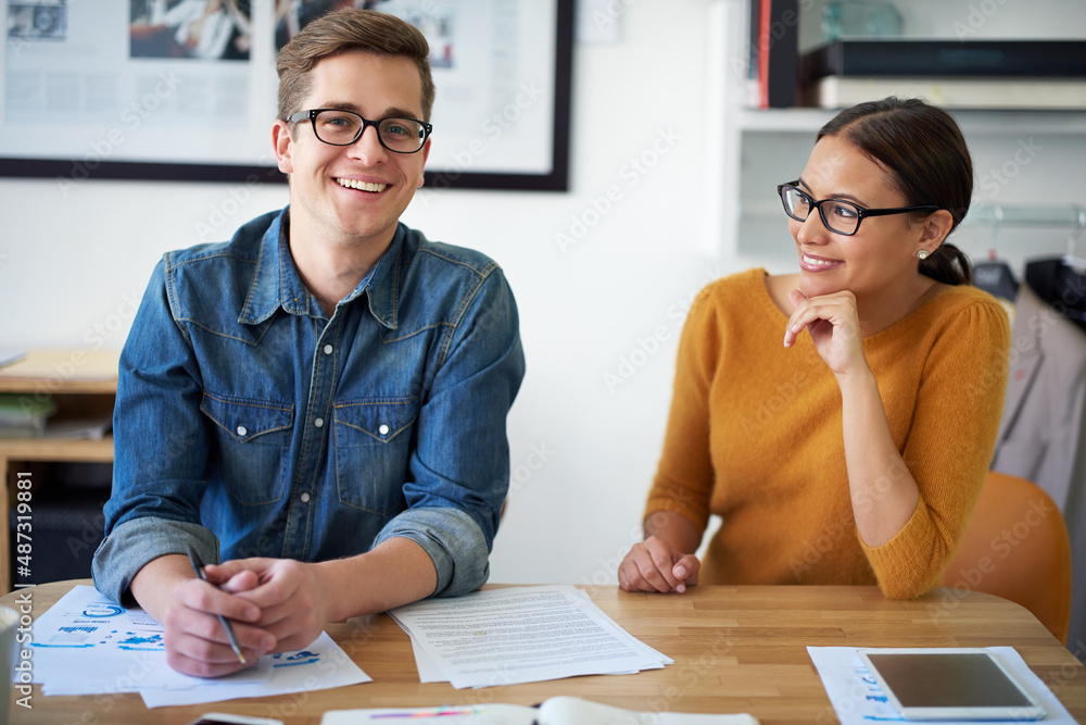 Poster having fun as creative collaborators. portrait of two colleagues working together on a creative proj