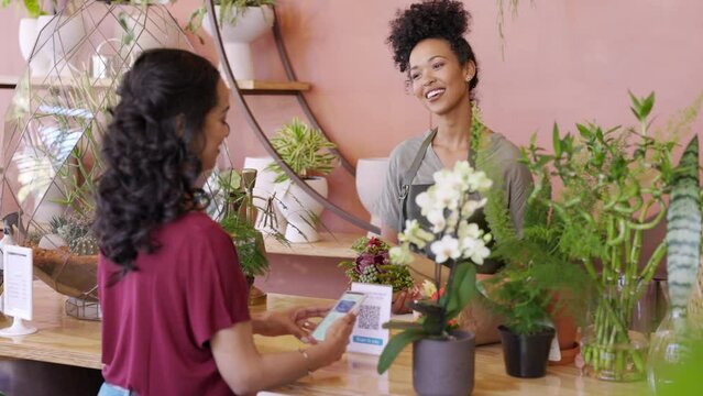 Customer paying with qr code for a bunch of flower