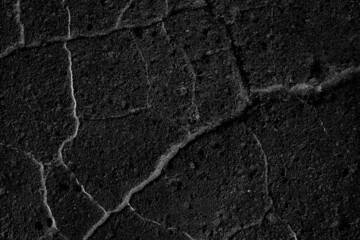 asphalt in cracks texture / abstract background cracks on asphalt road