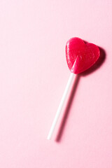 Heart shape red sweet lollypop