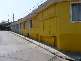 Photograph taken on a sunny day around Santiago de Chile City at Chili, showing the architecture and colours of this historical city. Streets, buildings and details.