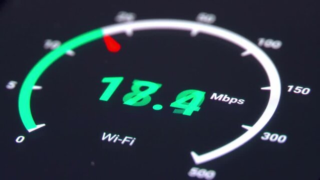 The concept of high-speed Internet and 5G connectivity. Measurement of 4G internet speed using a high-tech smartphone sensor showing Internet speed. finger presses Start button on the smartphone.