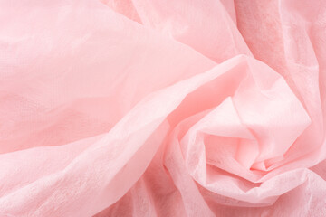 ピンク色の不織布の背景素材