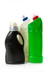  multicolored plastic bottles with household for chemicals on a white background