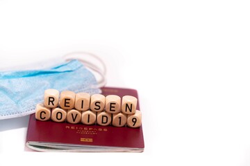 german word for travel, REISEN, Coronavirus and travel concept. Summer 2022 Notice in letters and...
