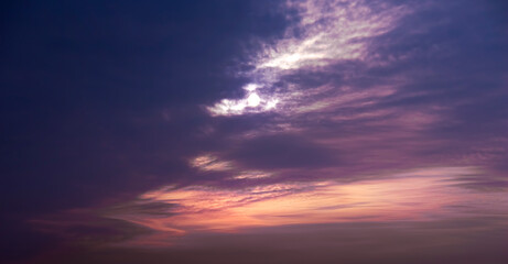 Beautiful sunset with clouds in lilac colors