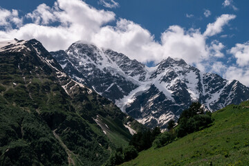 Fototapeta na wymiar Greater Caucasus Range. Glacier Seven on mount Donguz-Orun in Elbrus region. Summer landscape