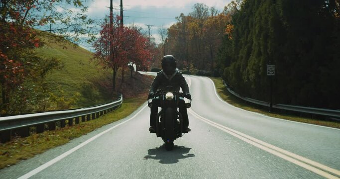Motorcycle Driving on Scenic Road in Autumn Slow Motion 4K