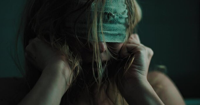 stressed girl with covered eyes suffers from depression