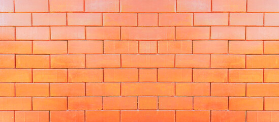 Obraz premium Tekstura pomarańczowej ściany betonowej na tle