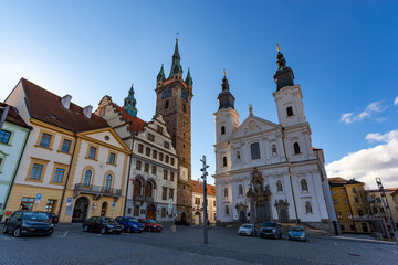 Fototapeta na wymiar Black Tower and Church of Virgin Mary's Immaculate Conception in Klatovy, Czechia