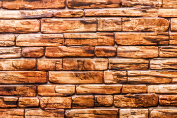 Imitation of a brick wall made of plastic close-up