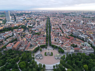 Aerial view of Arco della Pace in Milano, north Italy. Drone photography of Arch of Peace in Piazza Sempione, near Sempione park in the heart of Milan, Lombardy and Sforza Castle.