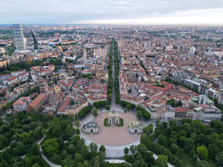 Aerial view of Arco della Pace in Milano, north Italy. Drone photography of Arch of Peace in Piazza Sempione, near Sempione park in the heart of Milan, Lombardy and Sforza Castle.