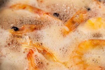 Cooking shrimp in hot water close-up. Selective focus