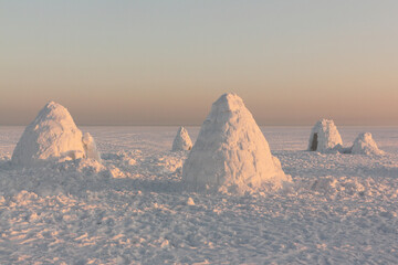 igloo on the snow in winter at sunset,  Novosibirsk, Russia