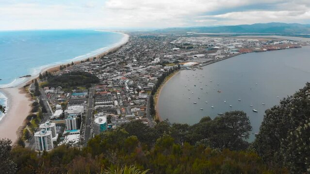 The panoramic view of Tauranga city from the Mount Maunganui summit, the drone footage.