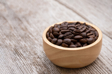 coffee beans in a wooden bowl