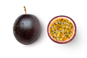 Purple Passion fruit (Maracuya Passiflora) with cut in half sliced isolated on white background. Top view. Flat lay.