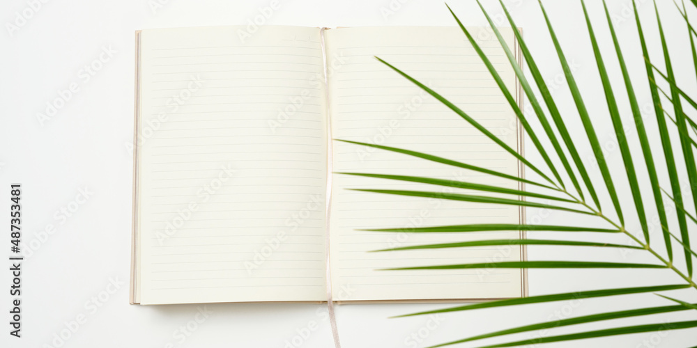 Poster open notebook with blank white sheets on a white background