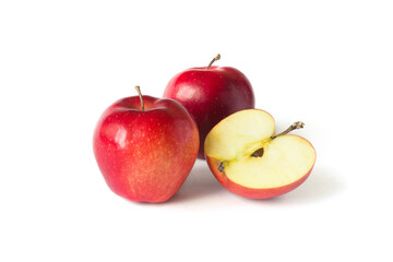 Red apples isolated on a white background. Whole and sliced apples.