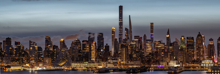 Fototapeta premium Manhattan panoramic view during early dark morning, long exposure detail shot, perfect fo web design.