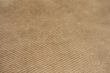 Close up of light brown corduroy fabric
