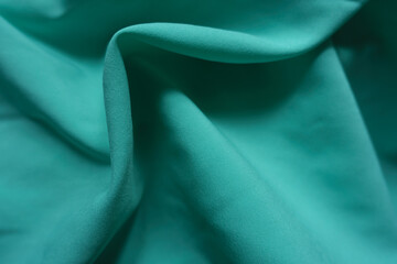Draped simple thin bluish green chiffon fabric