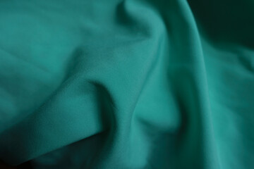 Rippled simple thin bluish green chiffon fabric