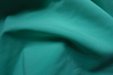 thin bluish green chiffon fabric with soft folds