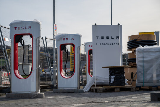 Bissendorf, Germany - February 13 2022: Construction of a Tesla charging station in a supermarket parking lot
