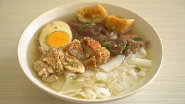 paste of rice flour or boiled Chinese pasta square with pork in clear soup