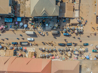 top-down aerial shots of the main street in Gompa City (Ganta), Liberia - obrazy, fototapety, plakaty