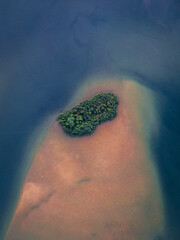 a single island in the dark sea near Robertsport, Liberia