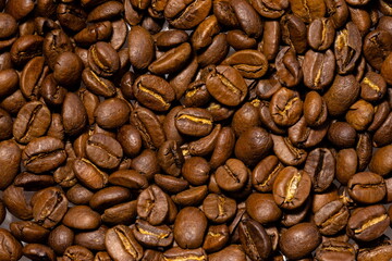 Many roasted coffee beans close up