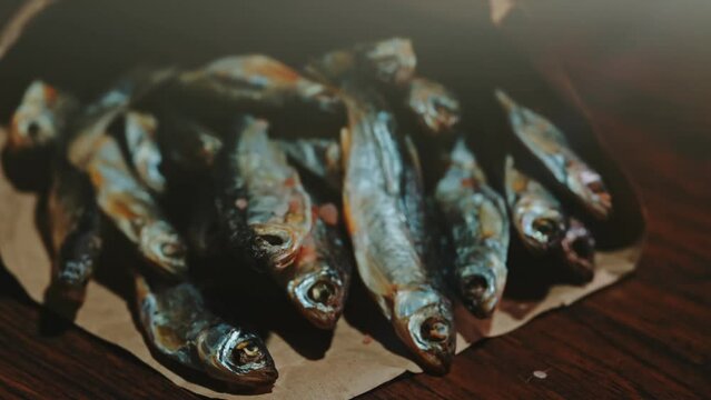 Lots of sun dried fish in the paper bag.
