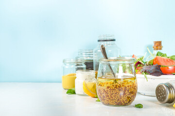 Healthy spring salad with various homemade dressings, salad sauces, 