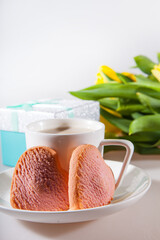 Yellow tulips, a surprise box and a cup of espresso. Romantic evening