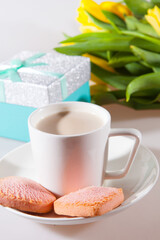 Yellow tulips, a surprise box and a cup of espresso. Romantic evening