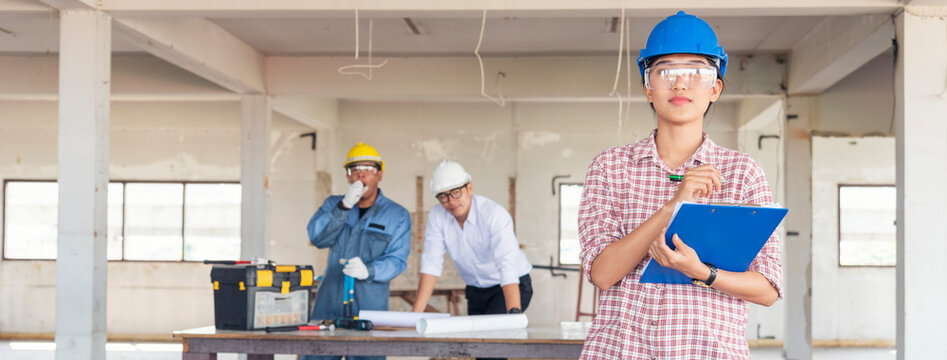 Banner Civil construction engineer team meeting on construction site with partner teamwork trust team consult together. Panorama image engineer team discuss wear hard hat construction engineer concept