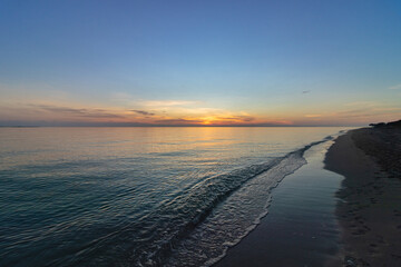 Beautiful sunrise on the ocean shore in the morning