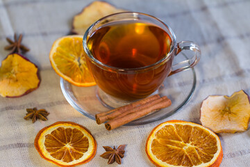 Cup of tea and slices of dried orange