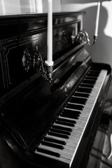 Fototapeta na wymiar antique piano with candles
