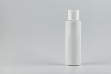 Skincare and cosmetology mockup with copy space. Unbranded white plastic flacon for cosmetics products. Branding identity template for text and design