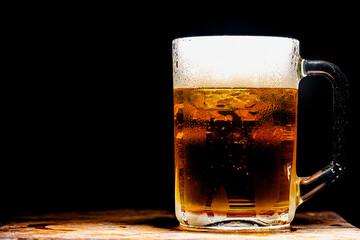 Beer near brick wall,Glass lager beer. Soft focus. Shallow DOF