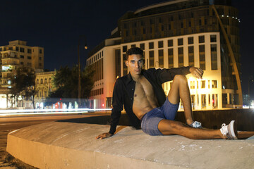 young man in Havana city at night